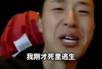 中国小伙在约旦被劫持后，举起五星红旗退敌