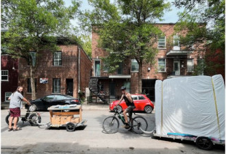 加拿大男子用自行车搬家！历时一个月