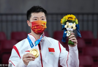马龙4-2力克樊振东夺冠 成奥运男单卫冕第一人