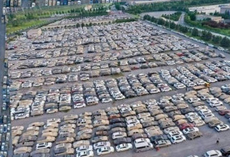 法新社：中国洪水过后 惊现一个巨大汽车坟场