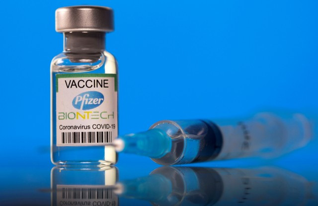 A vial labelled with the Pfizer-BioNTech coronavirus disease (COVID-19) vaccine is seen in this illustration picture taken March 19, 2021. REUTERS/Dado Ruvic/Illustration//File Photo