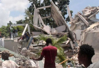海地地震死亡人数升至1297人 医院人满为患