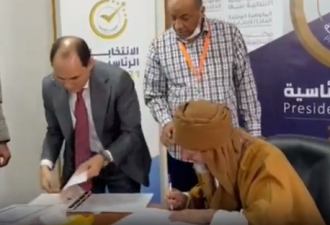 卡扎菲之子参选利比亚总统 现身站点登记