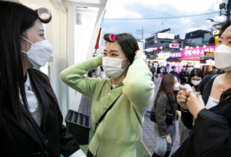 公共场合戴发卷：韩国女性对传统观念说“不”