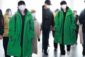 李宇春穿果岭绿大衣走机场，时尚亮丽吸引人