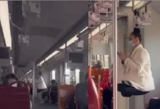上海地铁女子头悬梁半空打坐引热议