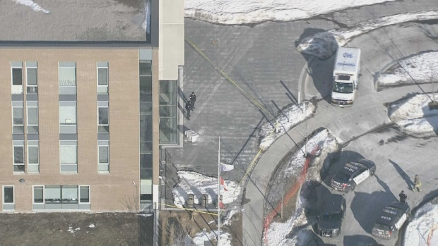 Police are shown at the scene of a shooting at a Scarborough high school on Monday afternoon.