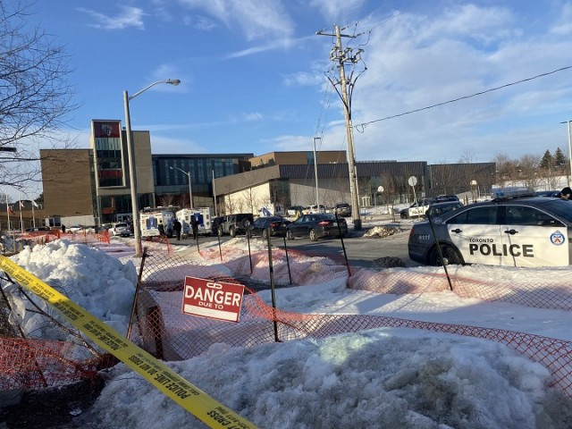 Police on scene following a school shooting at David and Mary Thomson Collegiate Institute in Toronto.