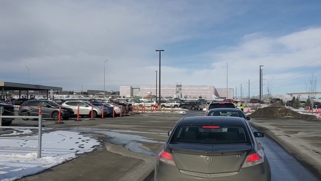 A line of vehicles snakes its way through the Tsuut'ina Costco parking lot to the gas pumps on Feb. 26. The store is paying to have Tsuut'ina Police members help direct traffic during peak times.