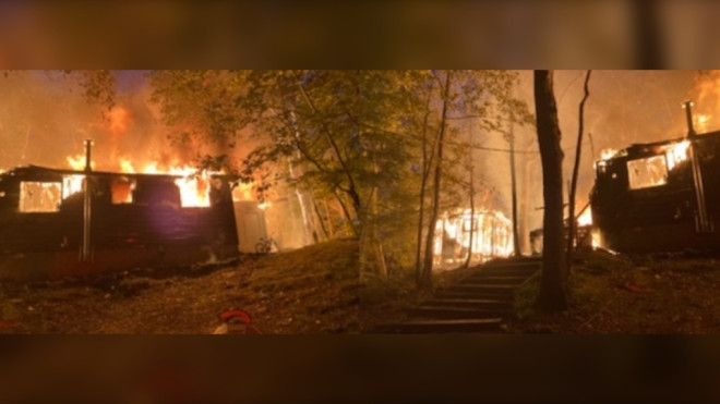 No injuries were reported after a fire destroyed a cottage and adjacent bunker in Port Carling Saturday, June 9, 2022. (Provided/Ryan Murrell) 