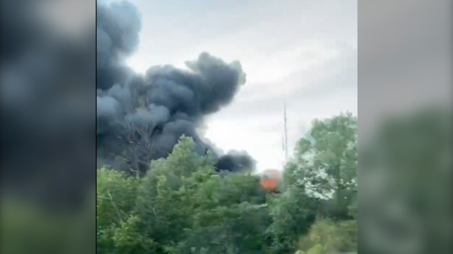 Smoke billows from the scene of a fire on Courtice Court in Clarington Sunday July17, 2022. (@CheesyLeaf89 /Twitter)