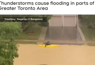 暴雨导致大多伦多局部发洪水，有人在路上划船