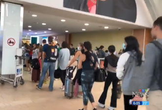 温哥华国际机场被搞“瘫痪”，万人挤爆