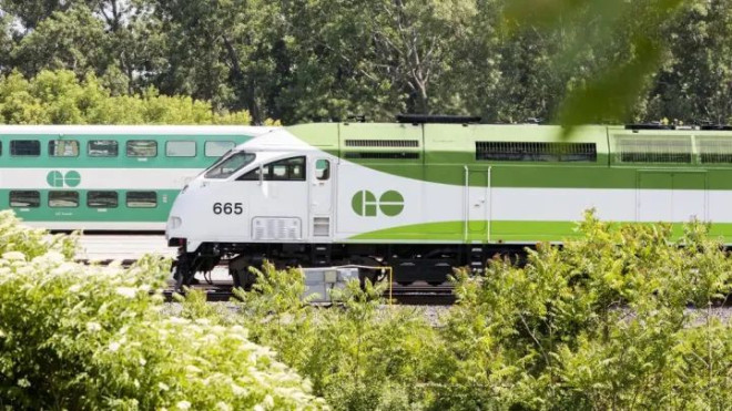 Two GO Trains passing each other.