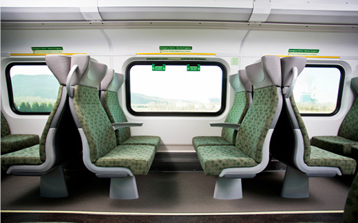 Photo of a new GO Train cab car interior, with brand new seats.