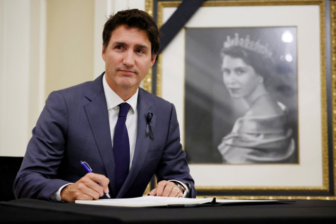 Canada's Prime Minister Justin Trudeau signs a book of condolences for Britain's Queen Elizabeth at Rideau Hall in Ottawa