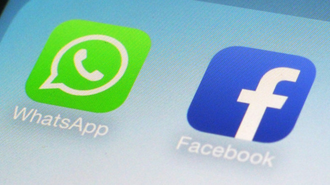 WhatsApp and Facebook app icons are seen on a smartphone in New York on Feb. 19, 2014. (AP / Patrick Sison)