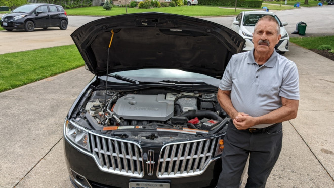 Ken Edwardson of St. Catharines, Ont., in front of his 2011 Lincoln MKZ hybrid. (Supplied)