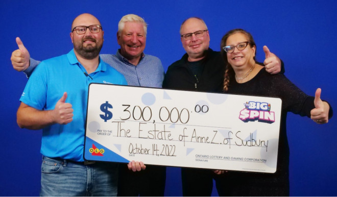 Anne Zacerkowny's three children and grandson headed to Toronto on Oct.14 to collect the prize on her behalf – and spin the wheel to see what she had won. (Supplied)
