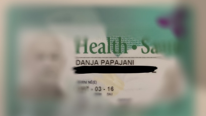 Danja Papajani's health card with a photo of an unknown man is seen in this undated photo. (Submitted) 