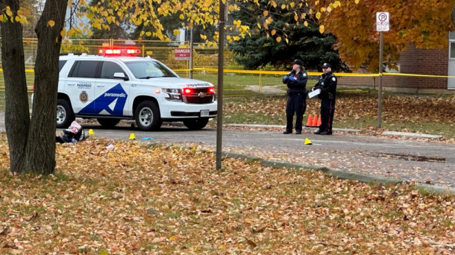 Police arrive at Woburn Collegiate Institute following a report of a shooting. (CTV News Toronto)