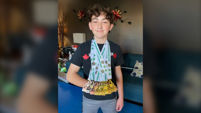 Kaleb Boyle shows seven medals he earned at the World Karate Championships. (Sean Irvine/ CTV News London) 