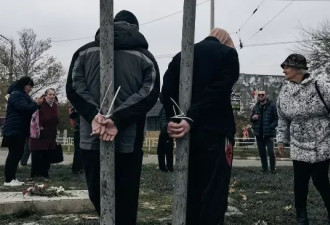 两名亲俄民众被绑树上示众 扎哈罗娃回应