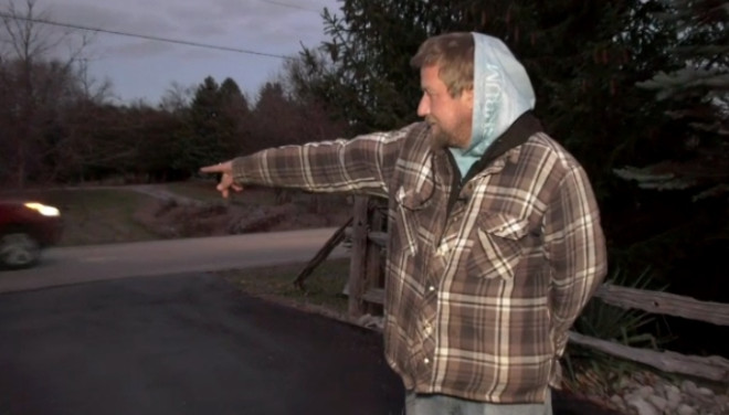 Derek Tappen points to the end of his driveway where the incident happened. (Dave Pettitt/CTV Kitchener)