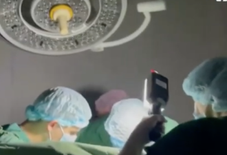 乌克兰停电 医生摸黑手术 民众到定点用电
