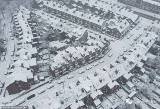 英国大雪搞瘫飞机铁路 儿童坠入冰湖死亡