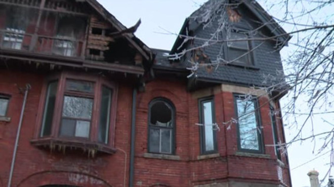 A home on Seaton Street is pictured after a 3-alarm fire tore through a row house in Cabbagetown Dec. 24, 2022. 