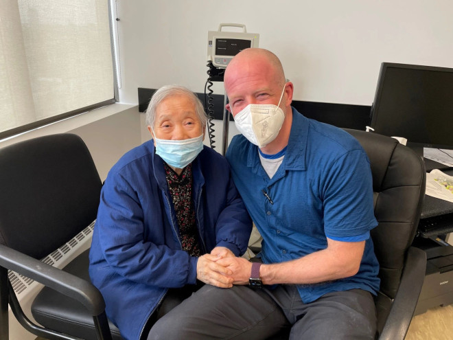 Dr. Darren Markland with a patient on April 6, 2022