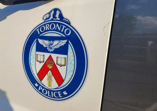 A Toronto police logo is seen on the side of a vehicle in this file photo.