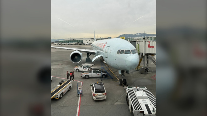 An Air Canada plane is seen at Vancouver International Airport after being forced to land due to a "door indication signal" on Jan. 30, 2023. (Twitter/Randy Govang) 