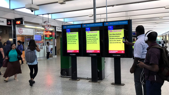 A TTC alert is posted at Warden Station during a delay on August 13, 2019. (CTV News Toronto)