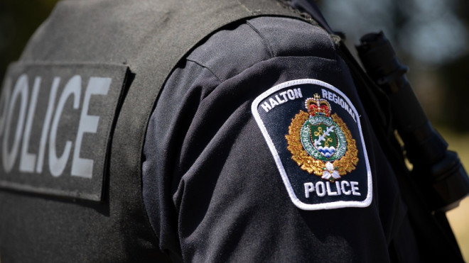 A Halton Regional Police officer is in view. (Halton Regional Police Service/Facebook)