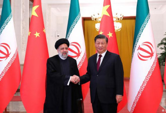 习近平会伊朗总统 吁“妥善解决”核问题