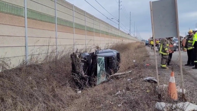 An image of the single-vehicle rollover on the QEW in Mississauga on Feb. 19. (OPP_HSD/Twitter)