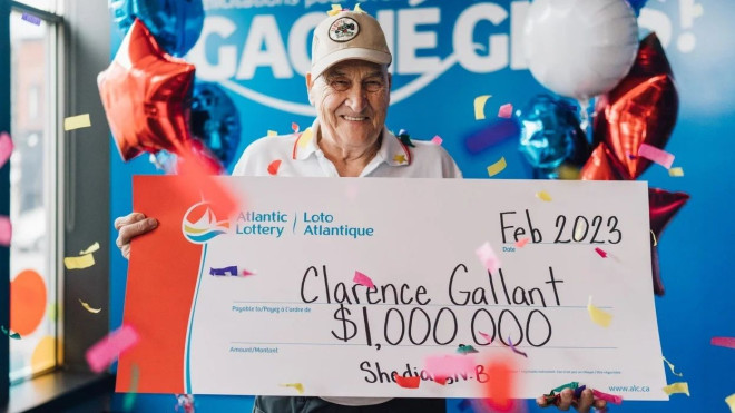 Lotto 6/49 winner Clarence Gallant with his cheque. 