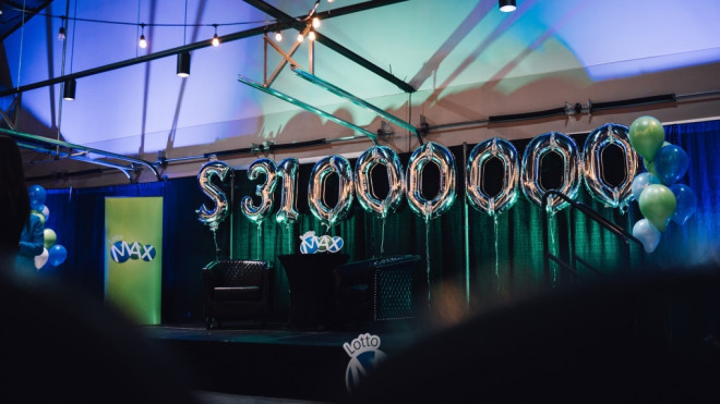 Balloons in the shape of numbers spell out $31,000,000 at an Atlantic Lottery event announcing a recent lotto winner on March 9, 2022. (Source: Atlantic Lottery/Facebook) 