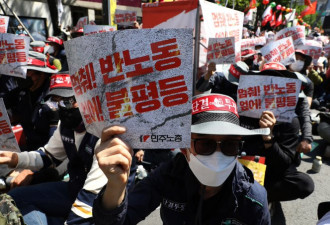 每周工时拟从52延至69小时 韩国劳方不满