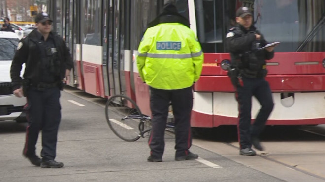 The scene of a collision between a Toronto Transit Commission street car and a cyclist on April 8, 2023 near Dundas and Dufferin streets can be seen above. (CP24)