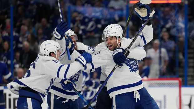 Toronto Maple Leafs center John Tavares (91) celebrates his game-winning goal against the Tampa Bay Lightning during overtime in Game 6 of an NHL hockey Stanley Cup first-round playoff series Saturday, April 29, 2023, in Tampa, Fla. (AP Photo/Chris O'Meara)