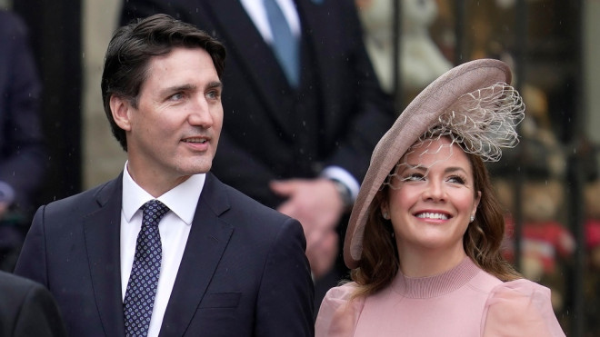 Canadian Prime Minister Justin Trudeau and Sophie Trudeau arrive at Westminster Abbey prior to the coronation ceremony of Britain's King Charles III in London Saturday, May 6, 2023. (AP Photo/Kin Cheung)