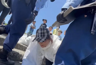 中国妇向日本警哭跪求饶：我老人家你放过我吧