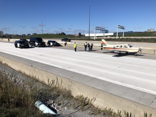 plane lands on 407