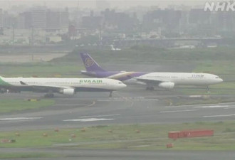 东京机场泰国客机撞上台长荣客机 主翼损坏 无法运行
