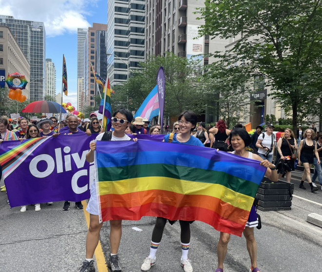Olivia posing for a photo with supporters who joined the march with her