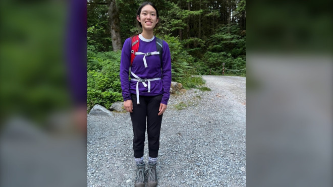 Esther Wang is pictured after emerging from the forest Thursday in a photo provided by her family. 