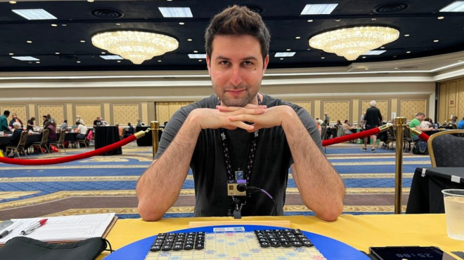 Montreal Scrabble champion Joshua Sokol poses with a board at the NASPA annual Scrabble Players Championship, where he won the top prize of $10,000 on July 19, 2023 (Image provided by Josh Greenway)